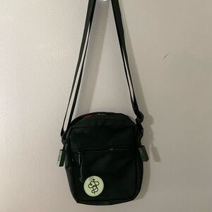 Baboon to the Moon sling bag in licorice black